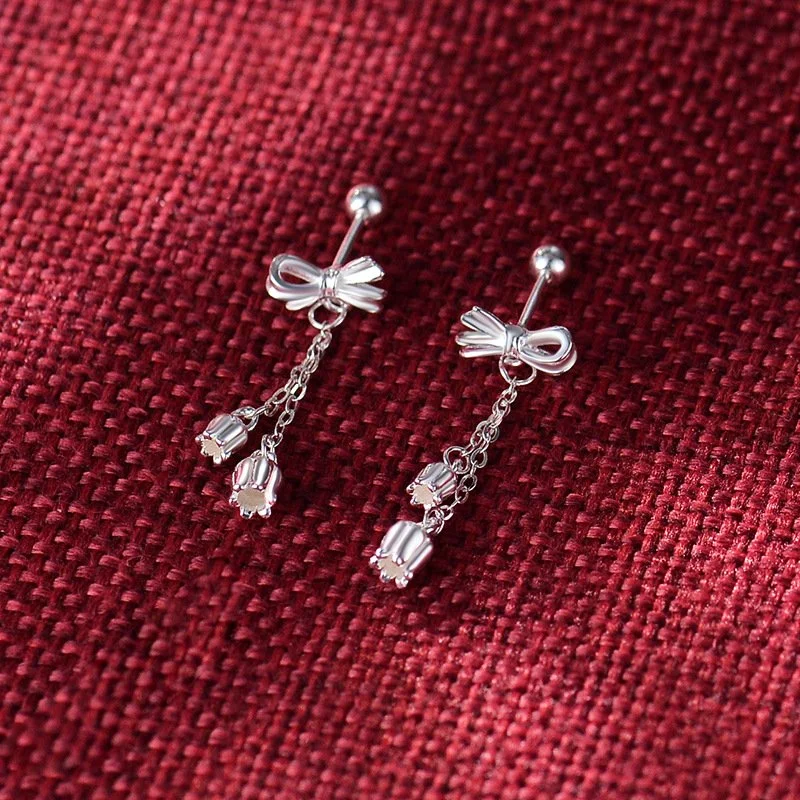 Silver bow‑shaped tassel earrings – Korean style pure silver ear studs