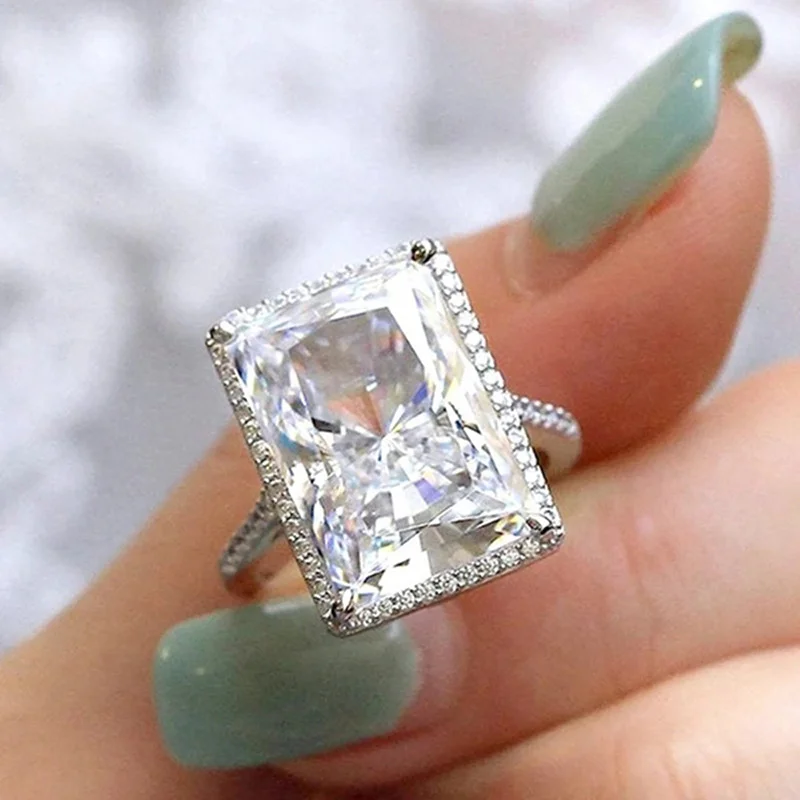 White gold ring with inlaid zircon, bright rectangular geometry for women