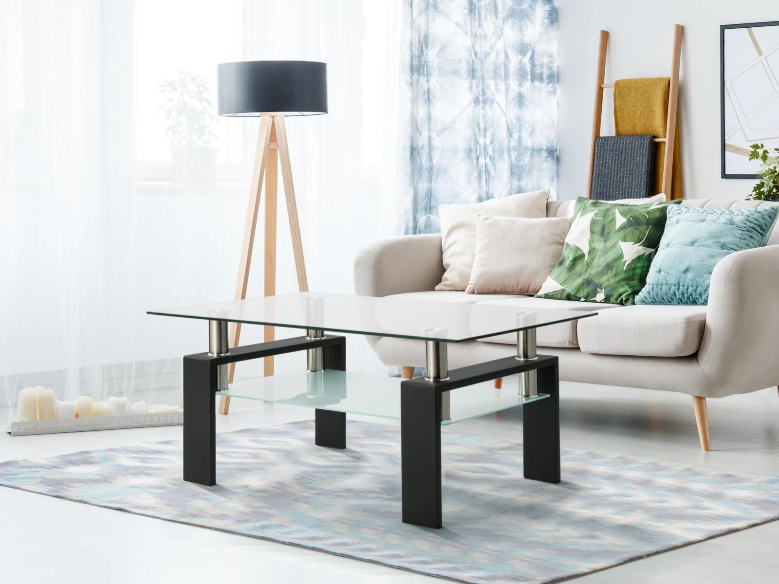 Clear rectangular glass coffee table with black accents, modern living room side table