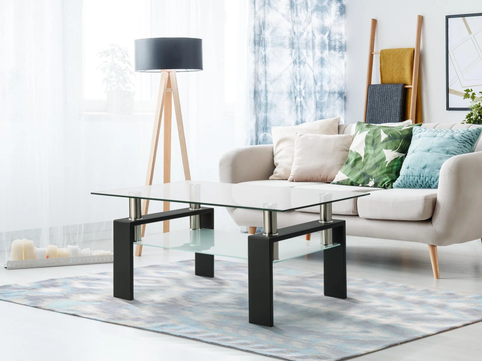 Clear rectangular glass coffee table with black accents, modern living room side table