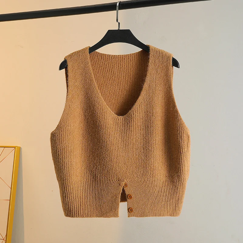 Layering a Sweater Over a Waistcoat and Wearing a Slit V Neck Knitted Vest