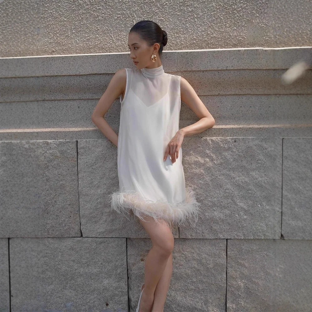 Solid-color Crew-neck Short Dress with Feather Detailing for a Luxe Look