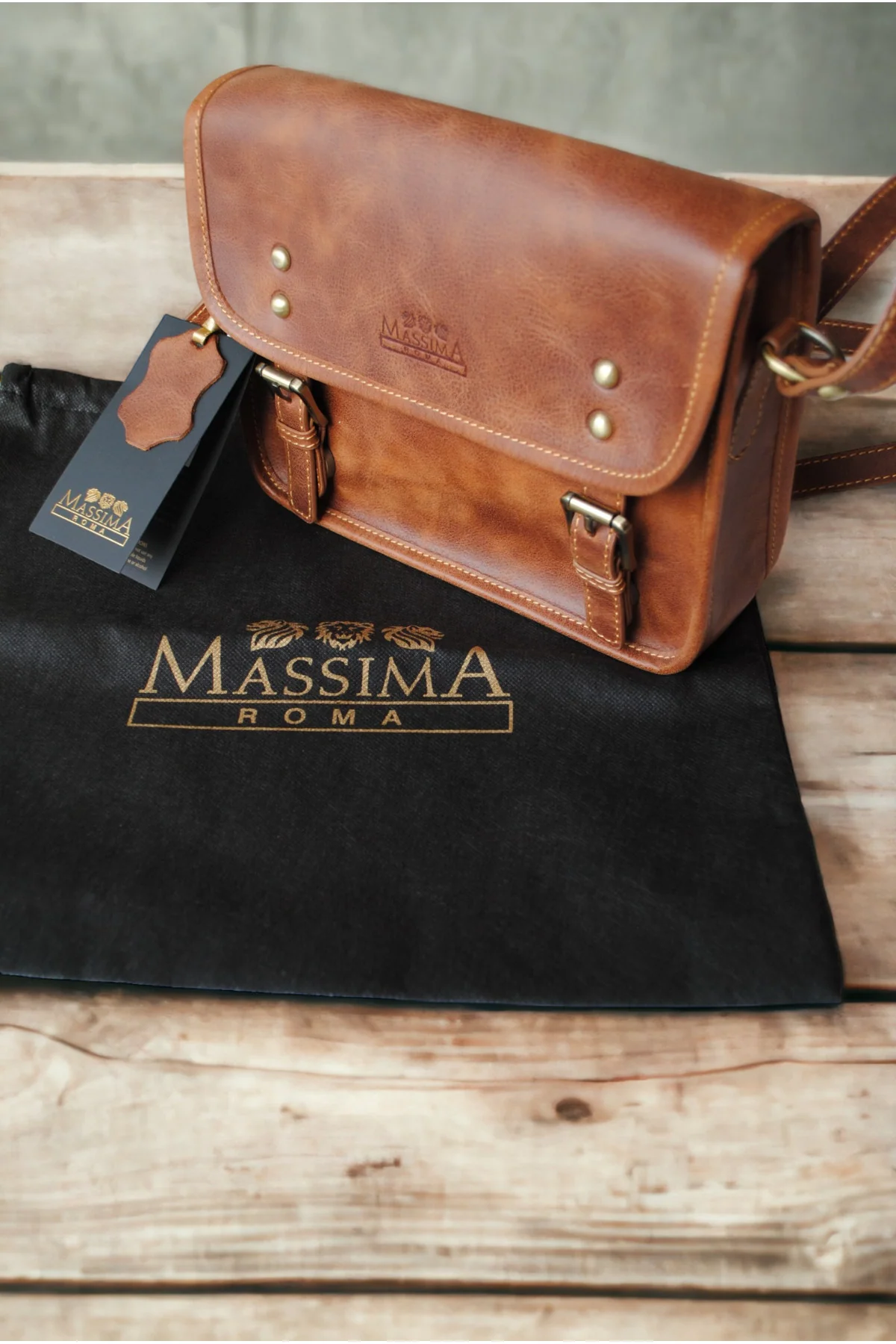 Genuine leather crossbody bag with zippered compartment and protective cover