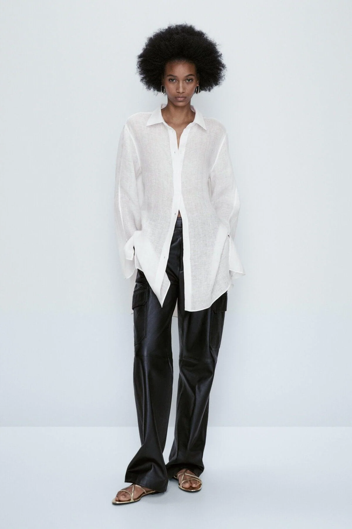 Linen oversized blouse with relaxed fit and natural texture