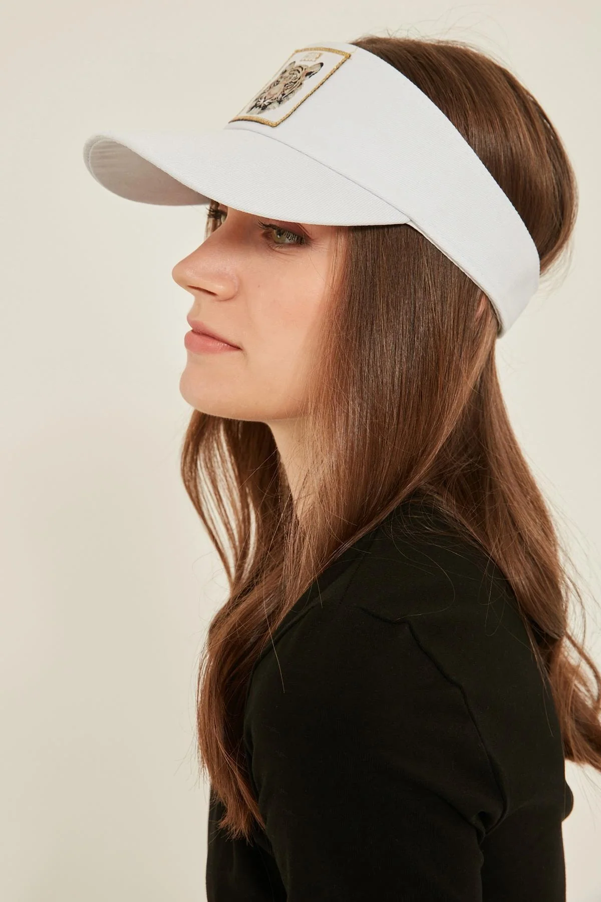 White cotton visor hat with adjustable back for all-day comfort