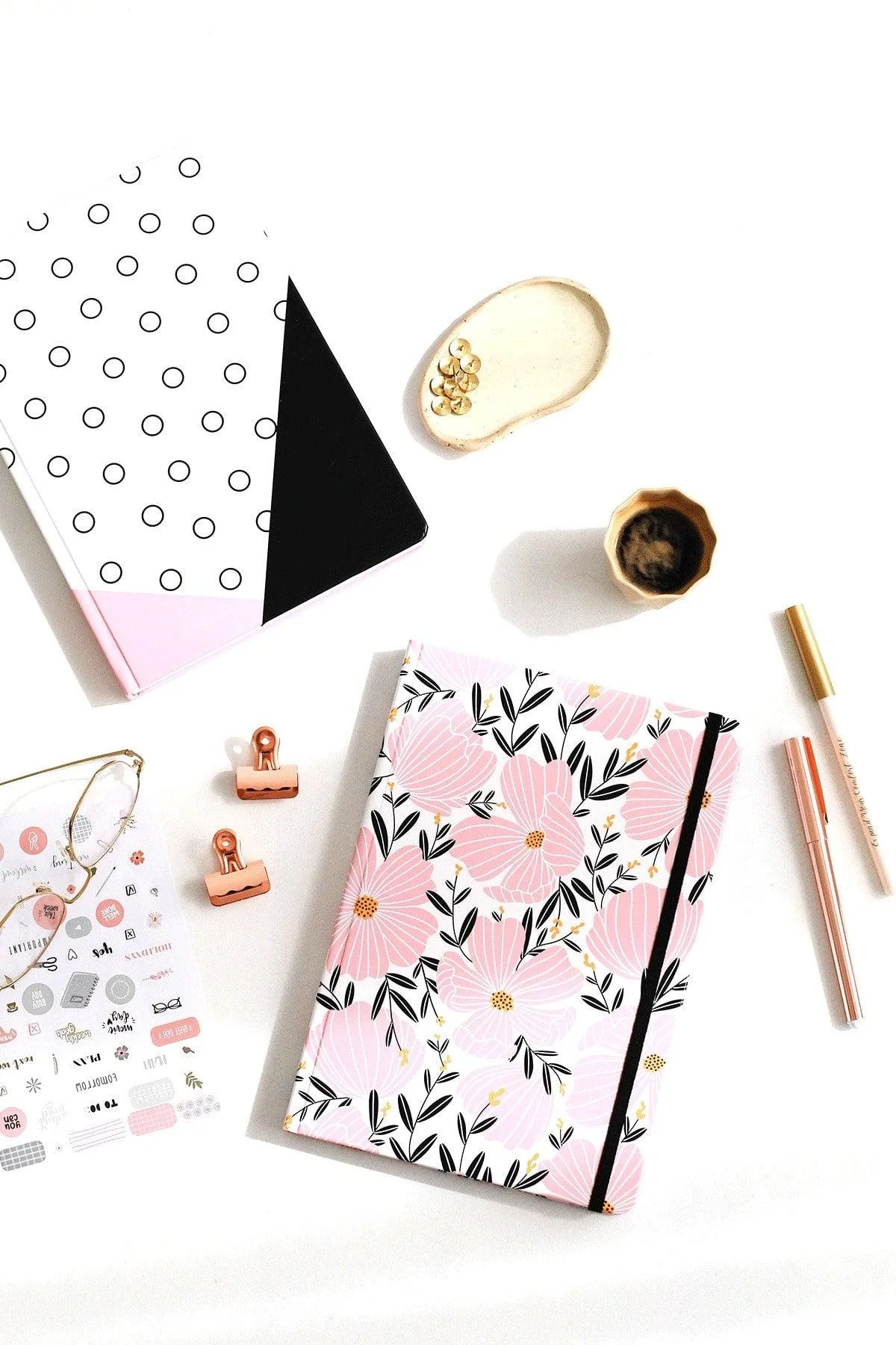 Hardcover lined notepad with elastic closure and pocket