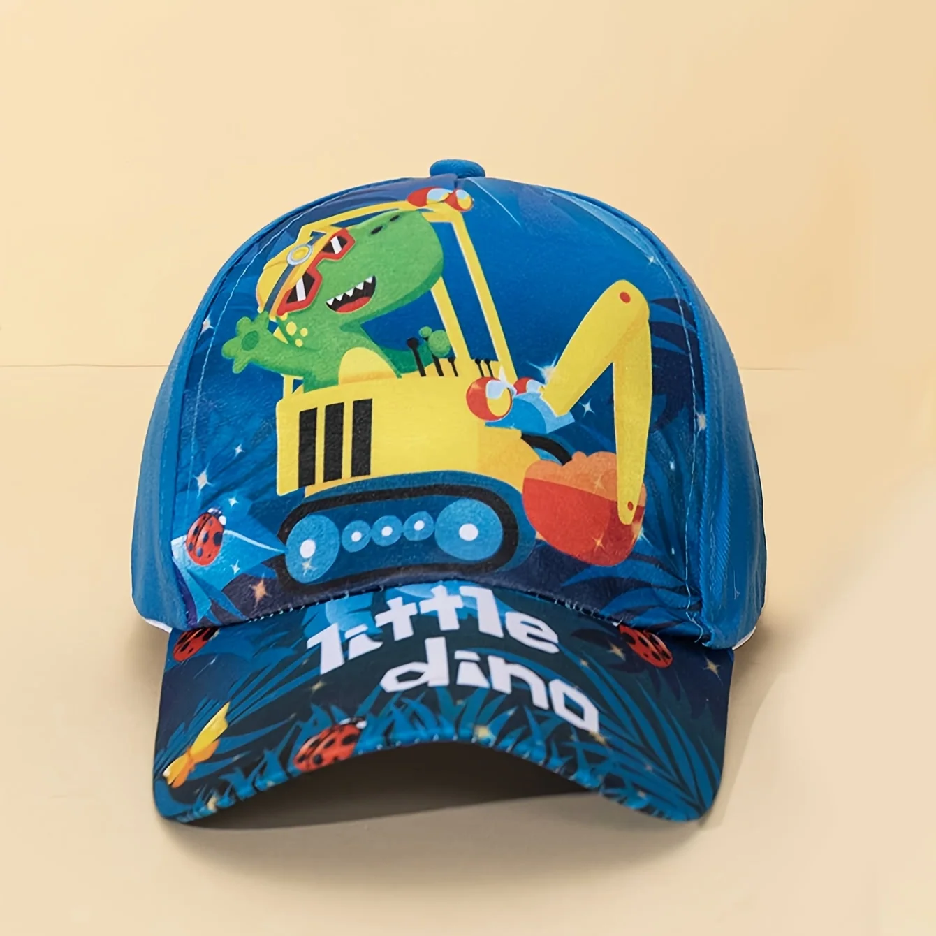 Space-themed adjustable baseball cap with astronaut and UFO print