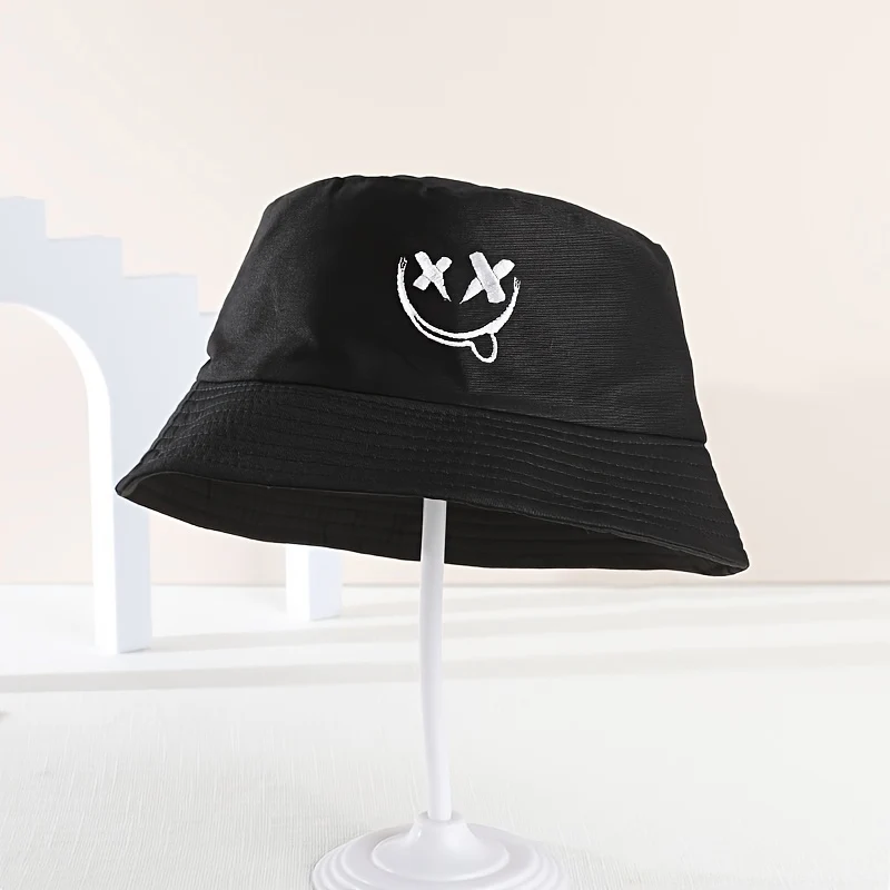 Fisherman-style hat with adjustable chin strap for sun protection