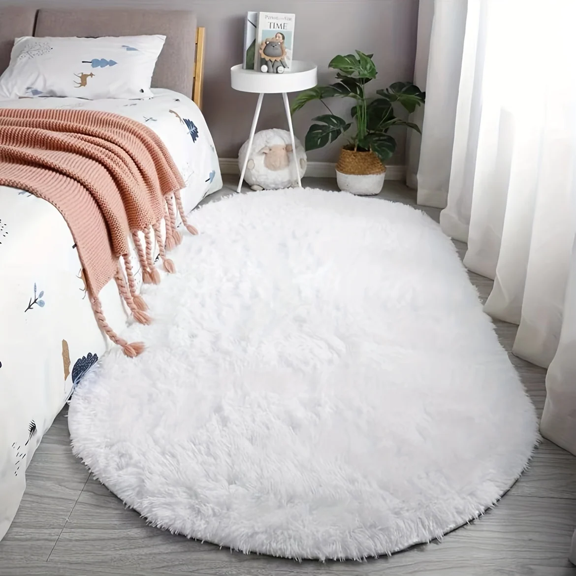 Oval mat for bedside tables, bed ends, and coffee tables
