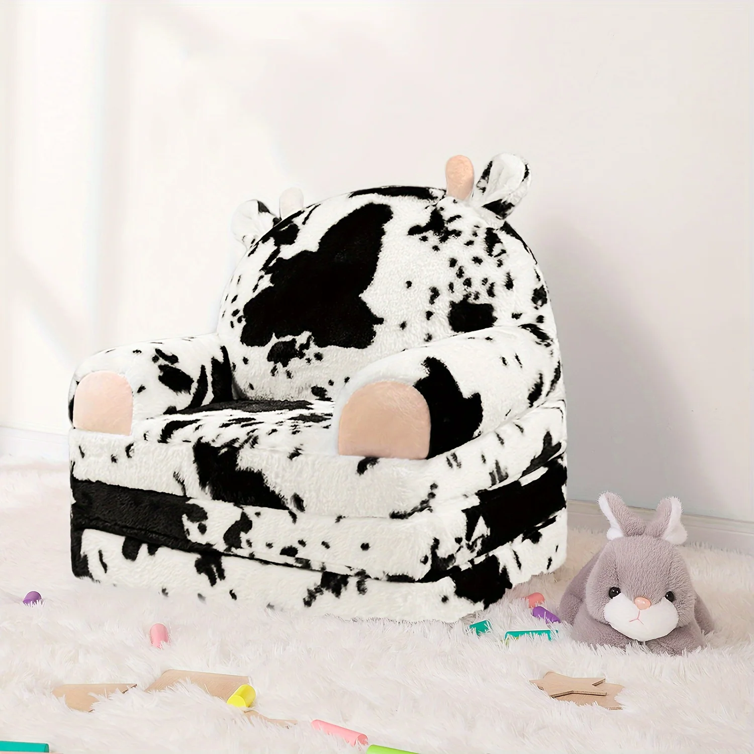 Plush toddler cow-print chair with removable cover