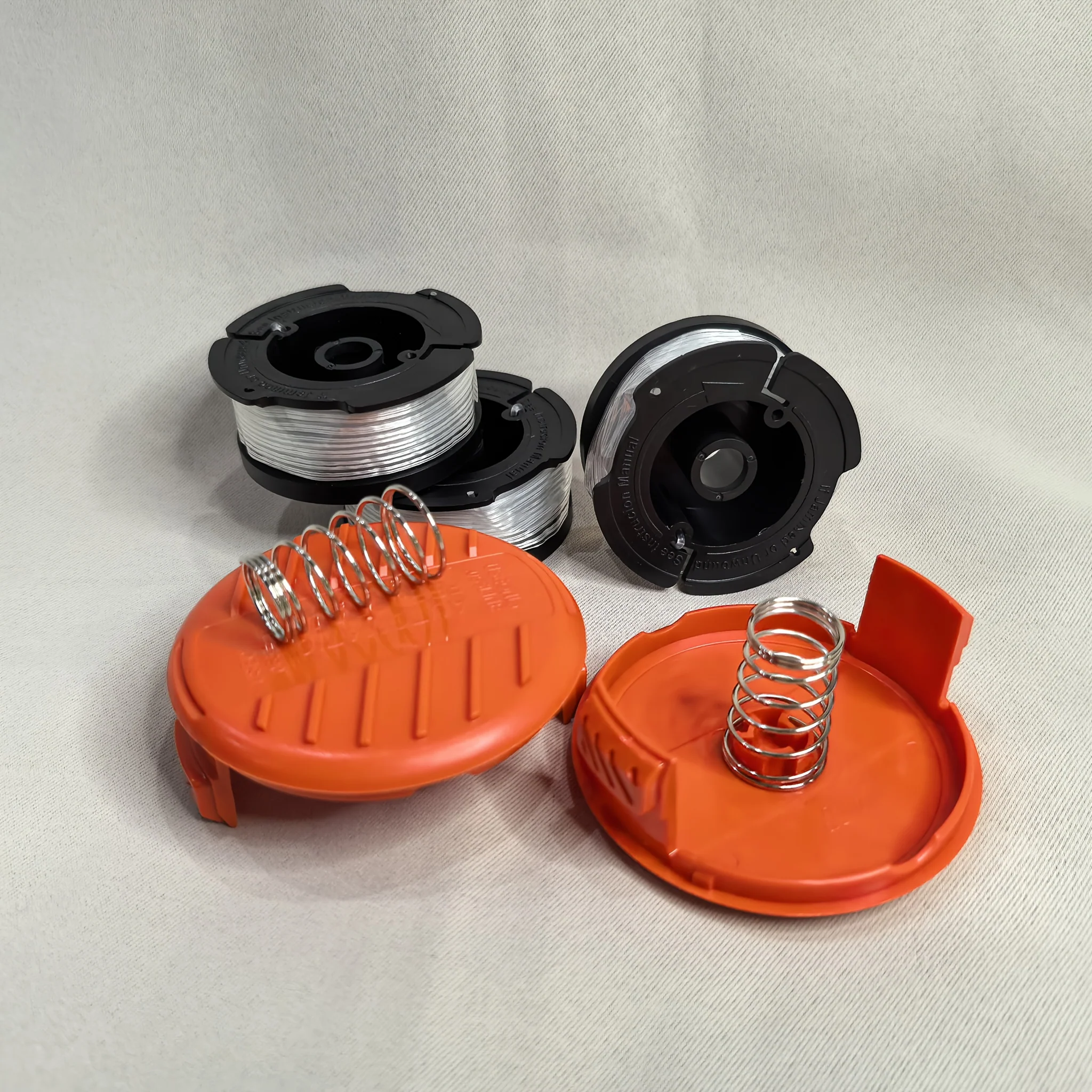 30-foot automatic-feed lawn mower string with spool cap and lid
