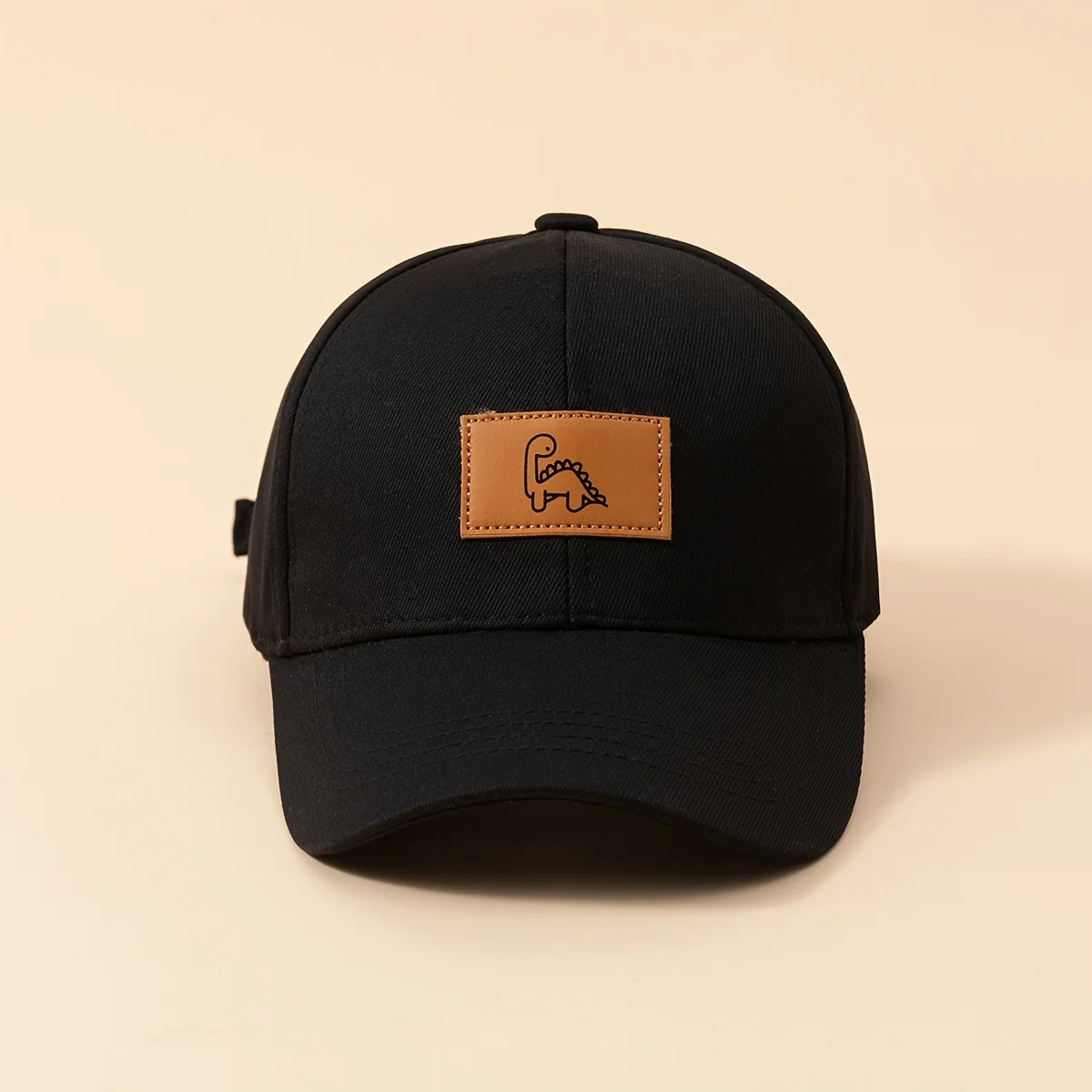 Kids' baseball cap with dinosaur leather patch design
