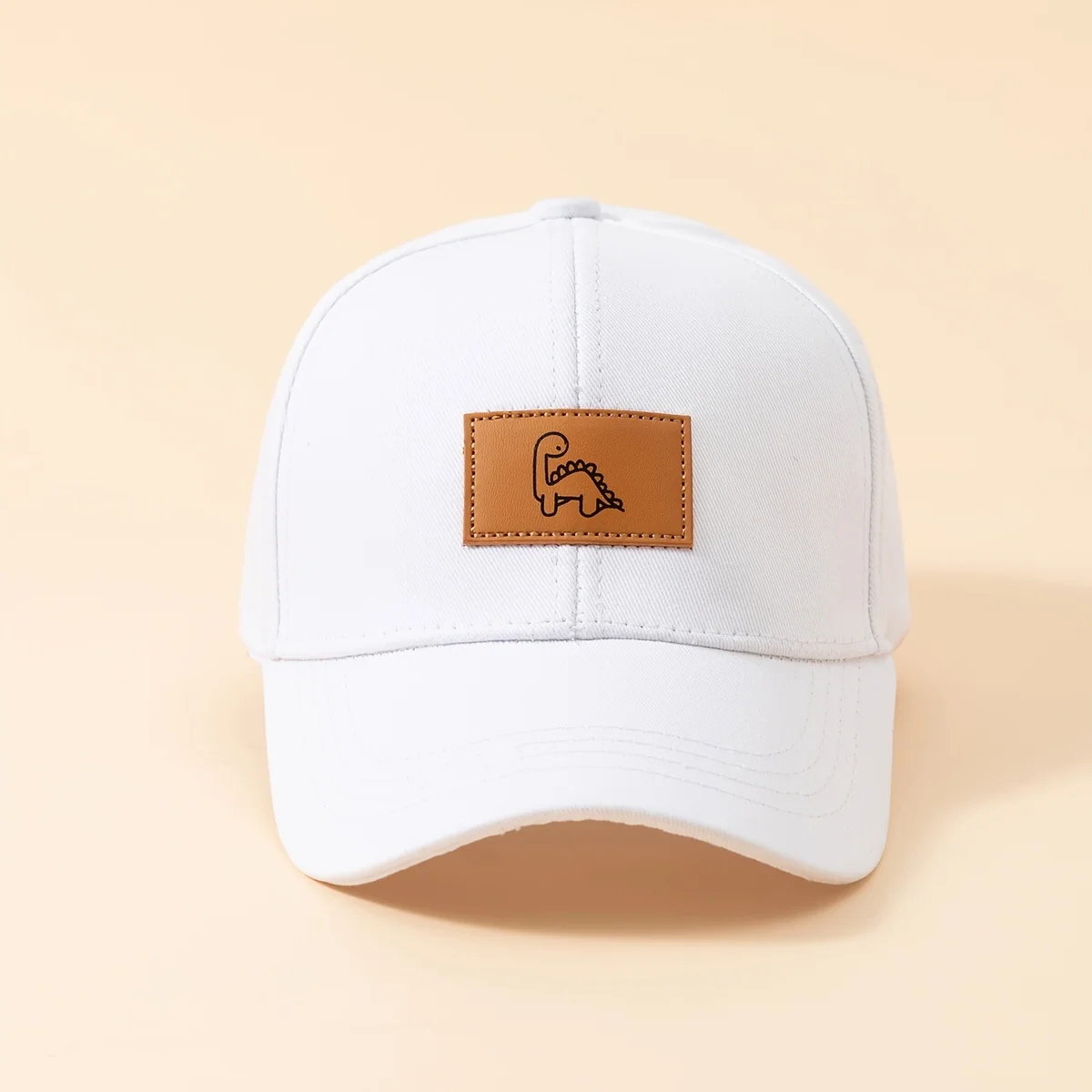 Kids' baseball cap with dinosaur leather patch design