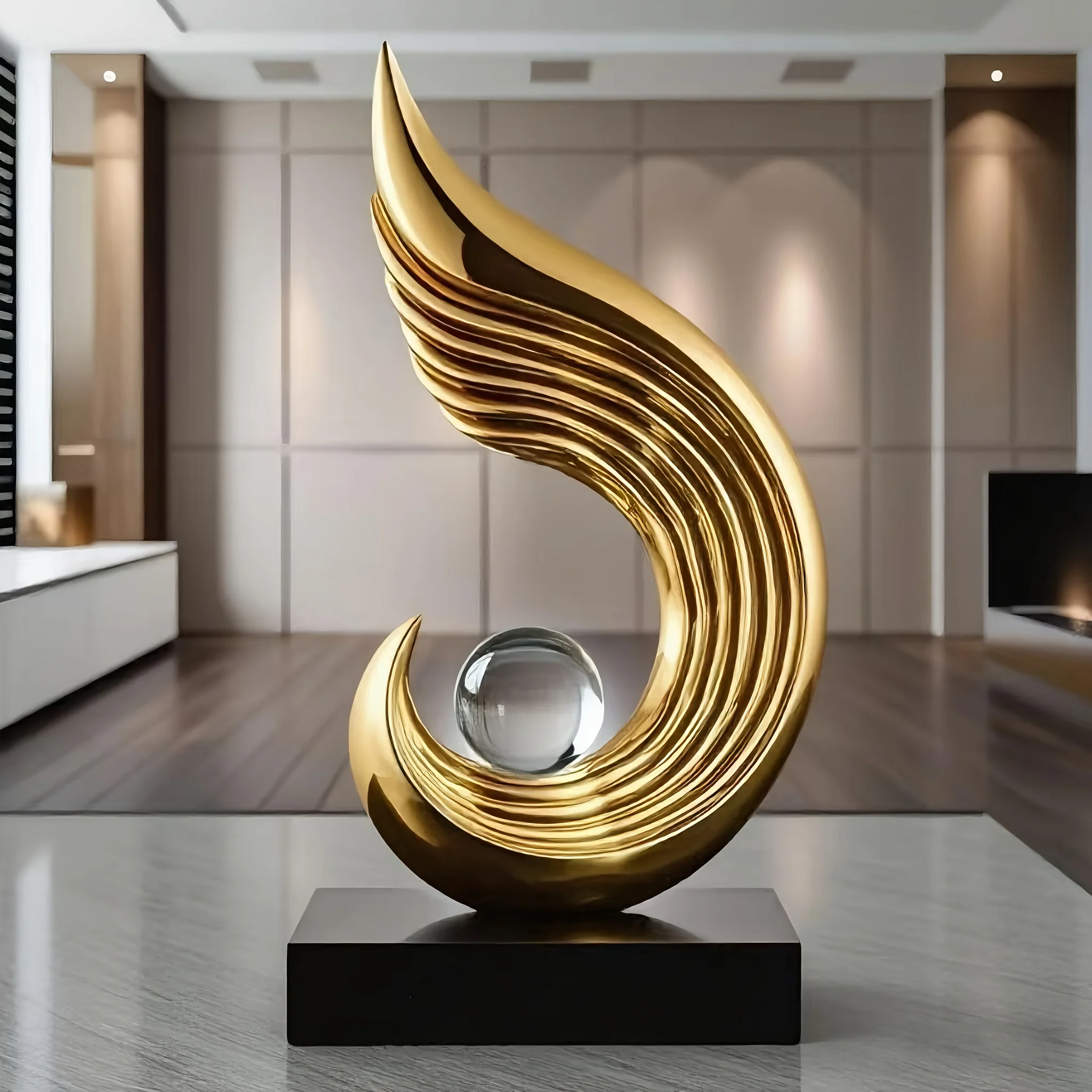 Golden winged resin art piece for elegant home decor