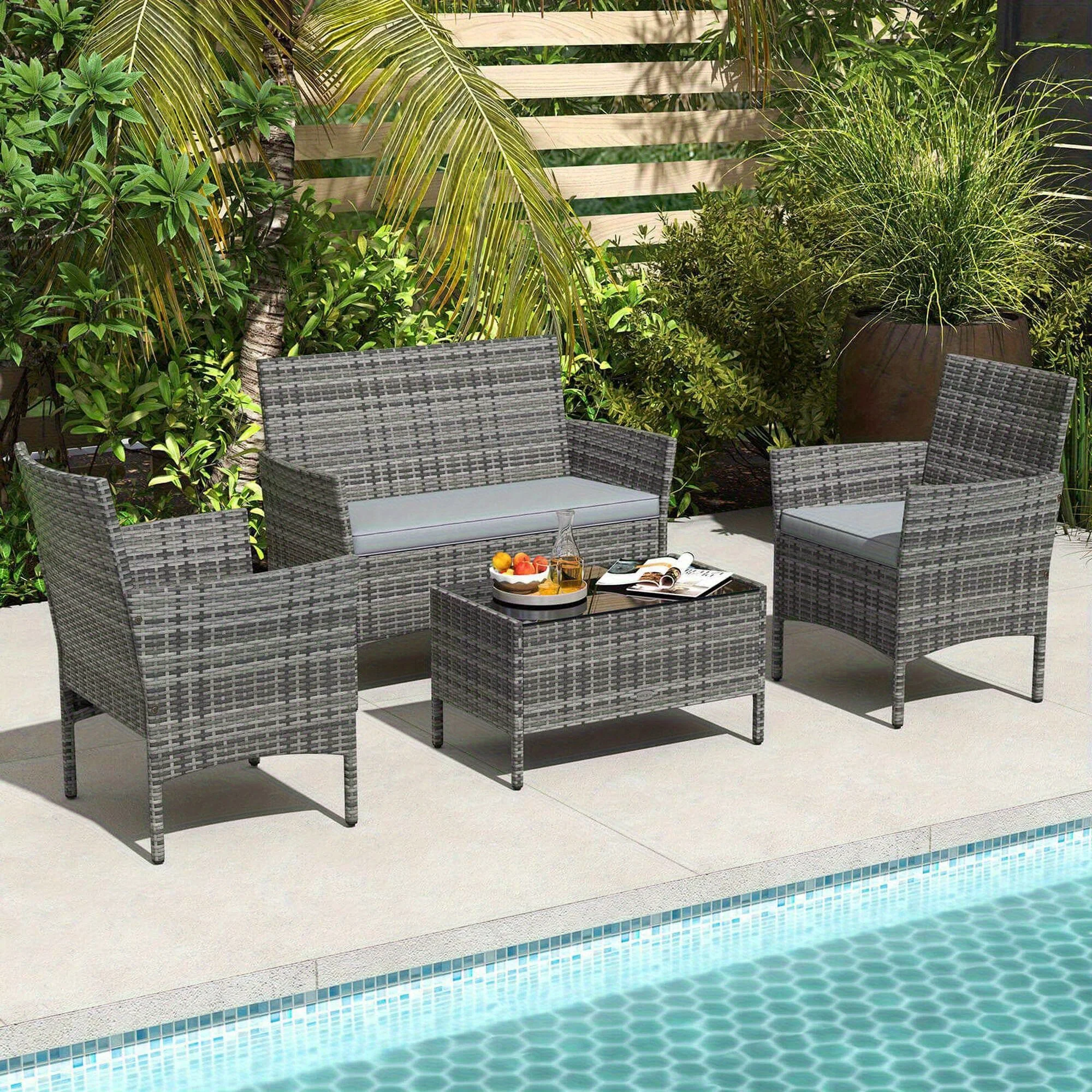 4-piece outdoor patio furniture set with washable cushions and glass table