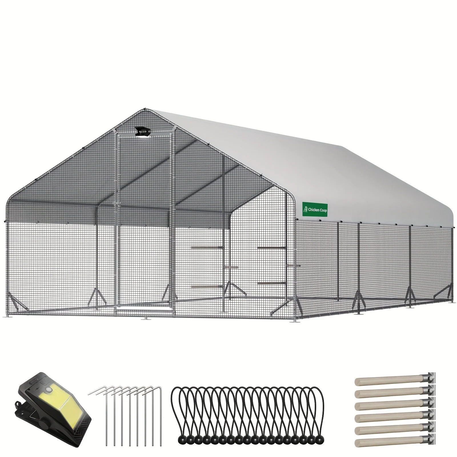 Walk-in metal chicken coop with attached run and solar-powered lighting