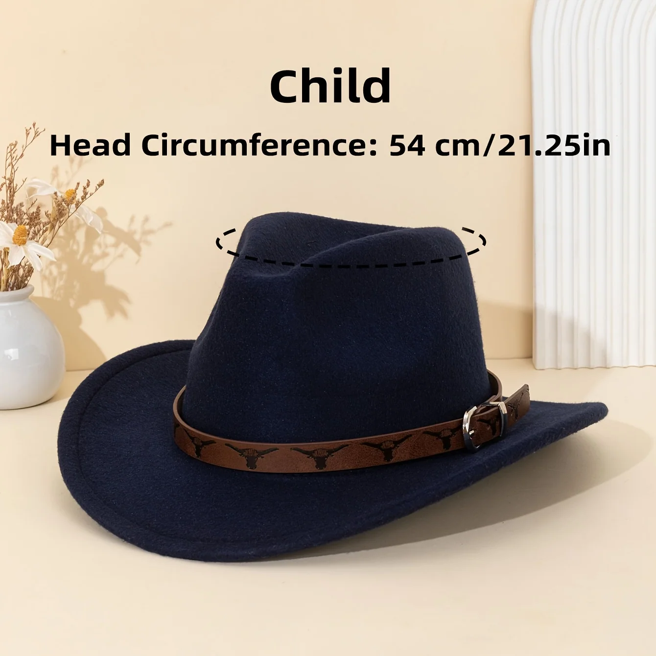 Brown felt cowboy hat with wide brim and leather band