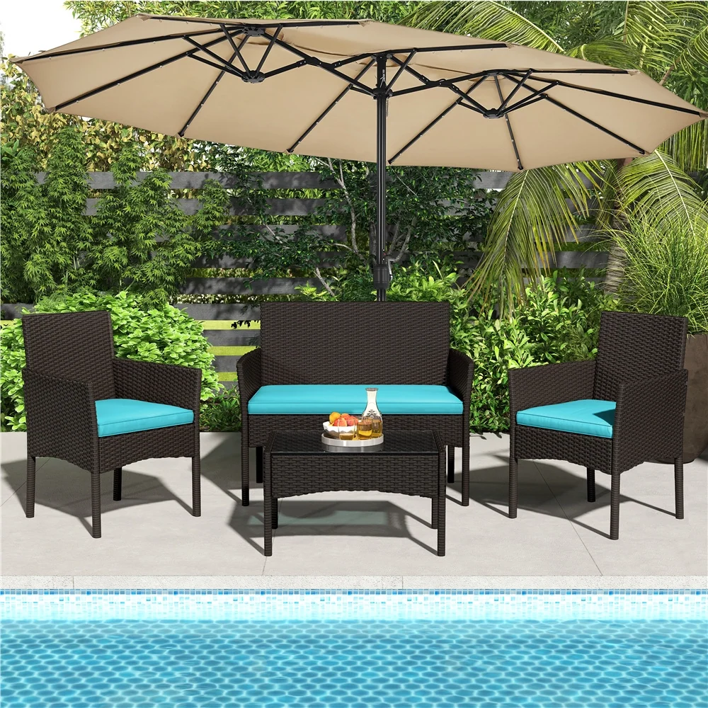 4-piece rattan conversation set with cushioned chairs and glass table