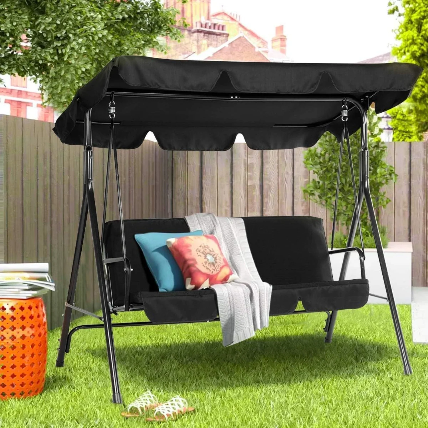 3-seat outdoor swing bench with removable cushions and adjustable awning