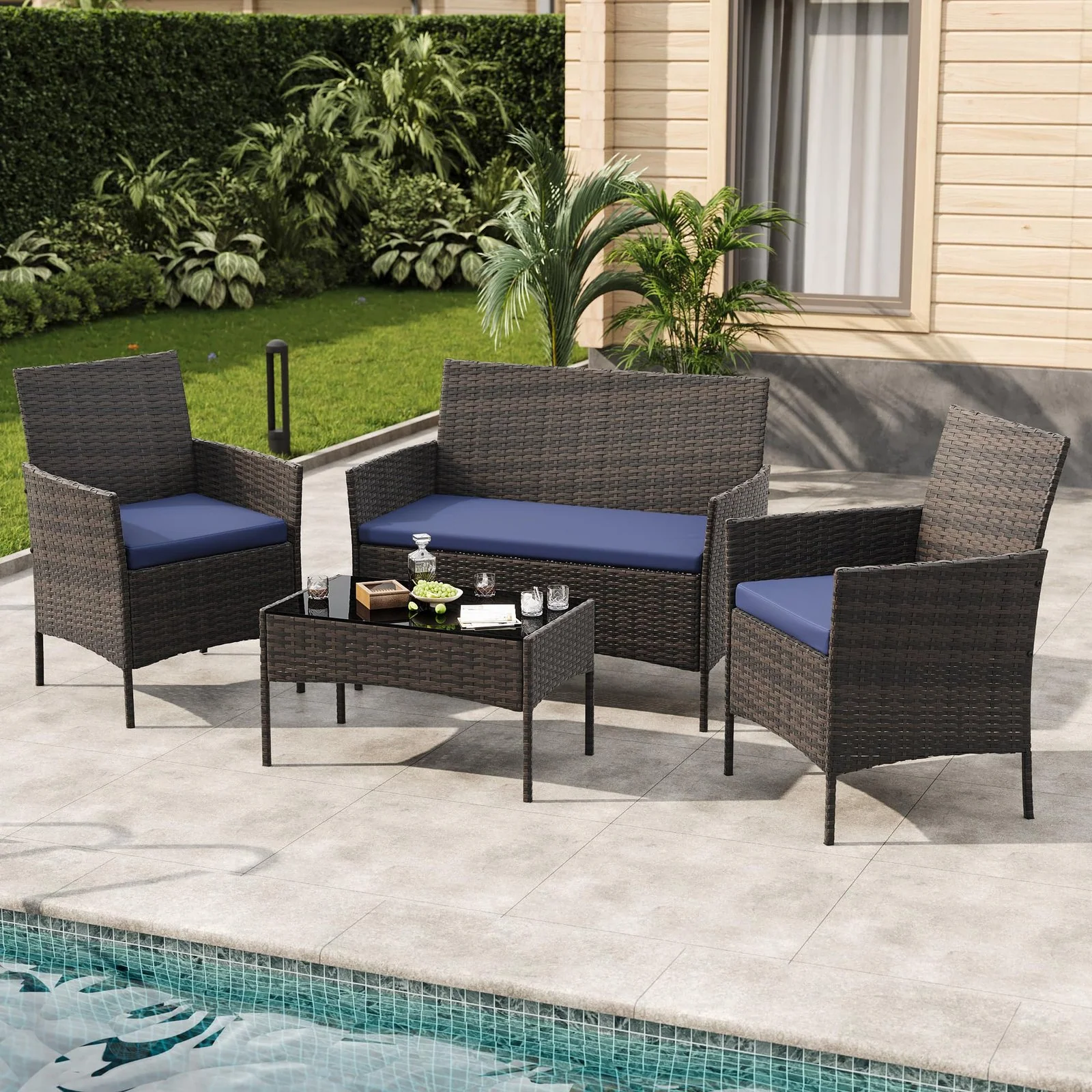 4-piece outdoor patio bistro set with wicker rattan seating and glass table