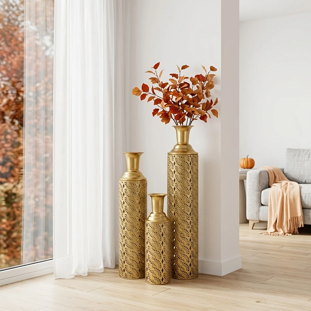 Set of 3 large hollow metal floor vases in gold finish