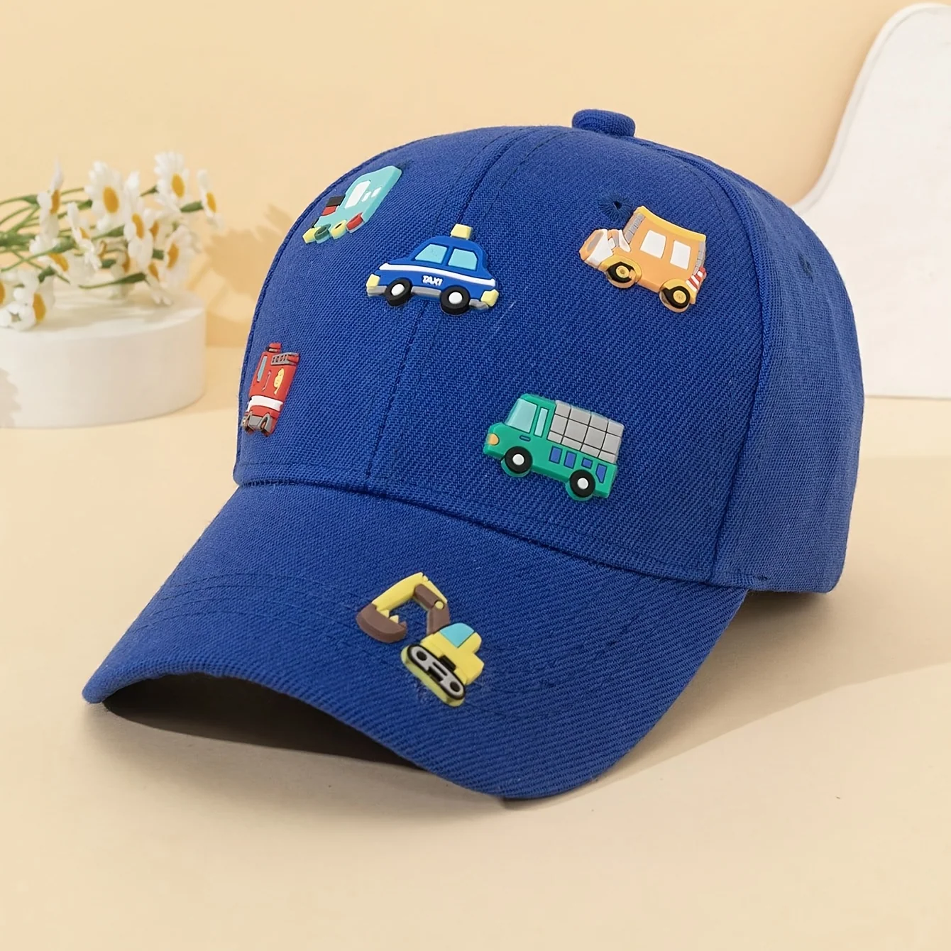 Three-dimensional cartoon mesh baseball cap with car designs