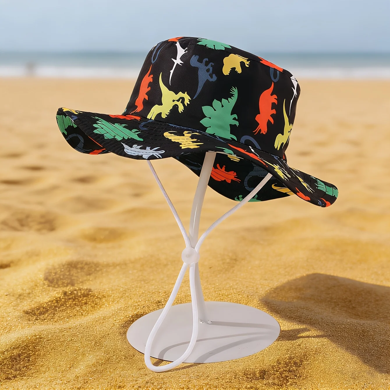 Toddler bucket hat with dinosaur print for sun protection