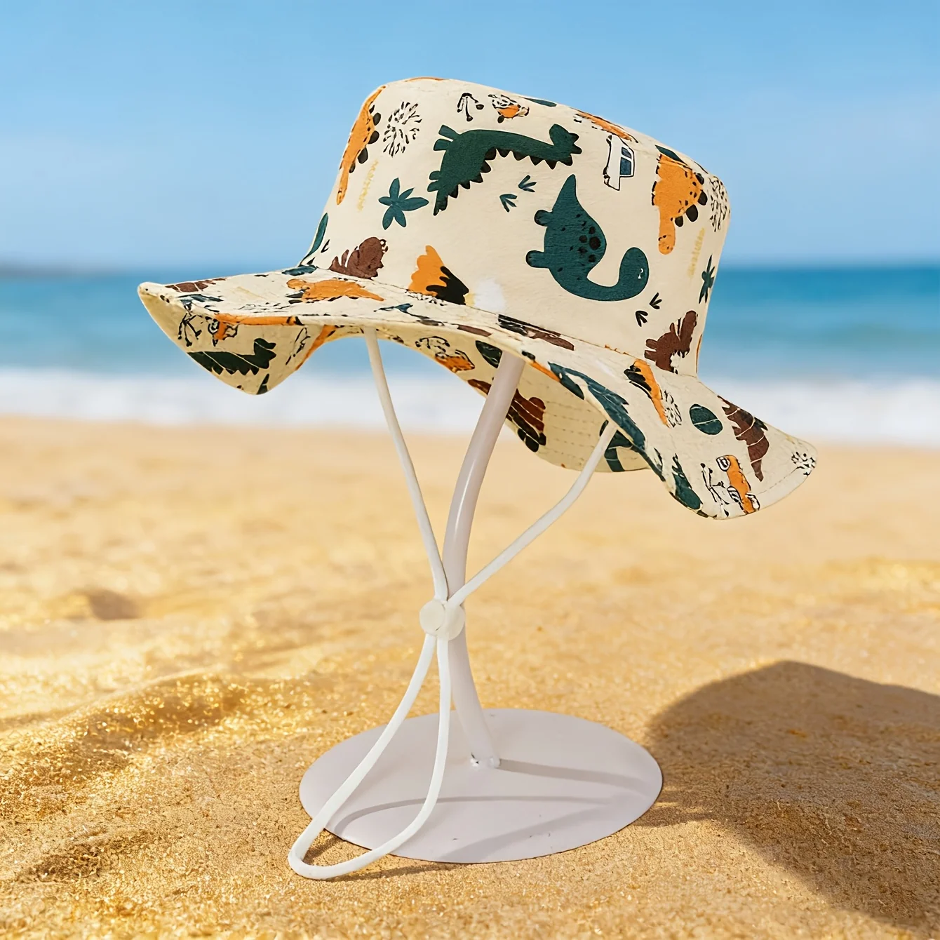 Toddler bucket hat with dinosaur print for sun protection