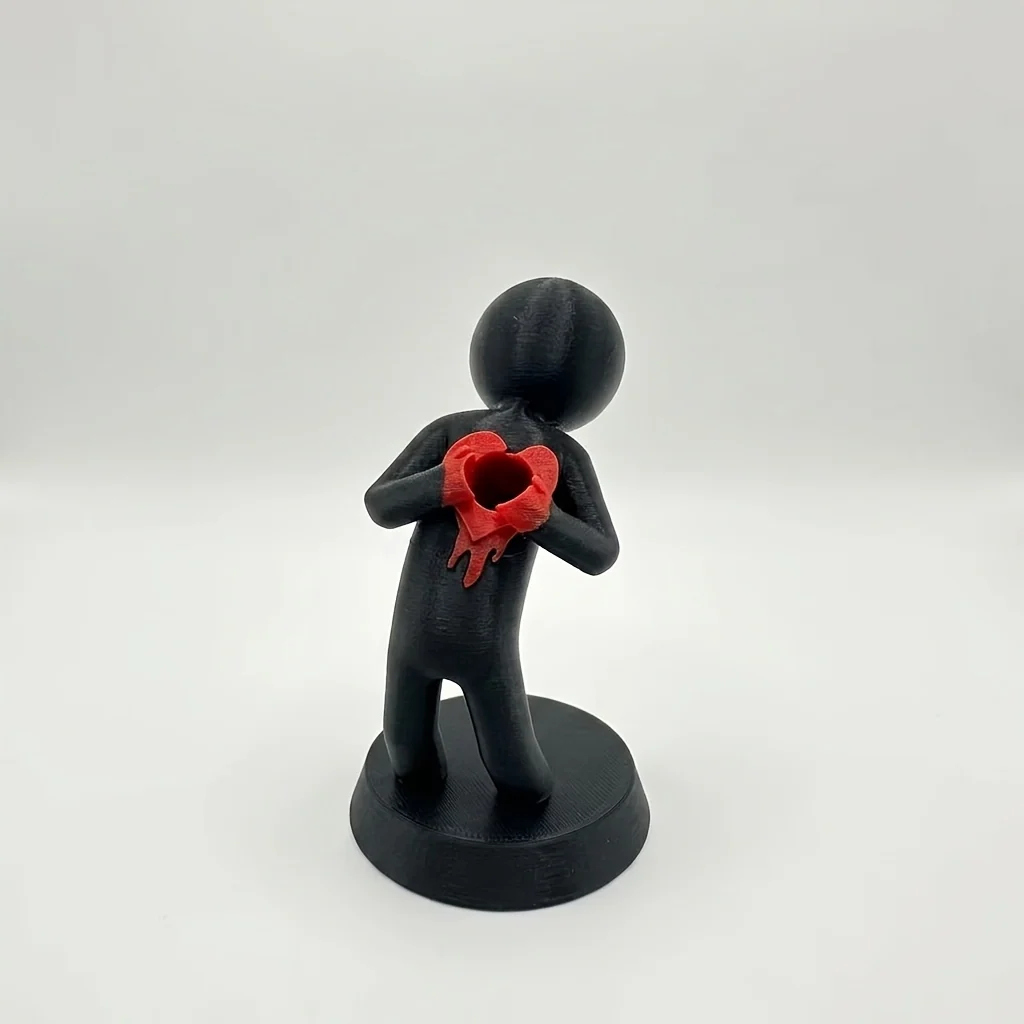 Broken heart desk pen holder with playful quote