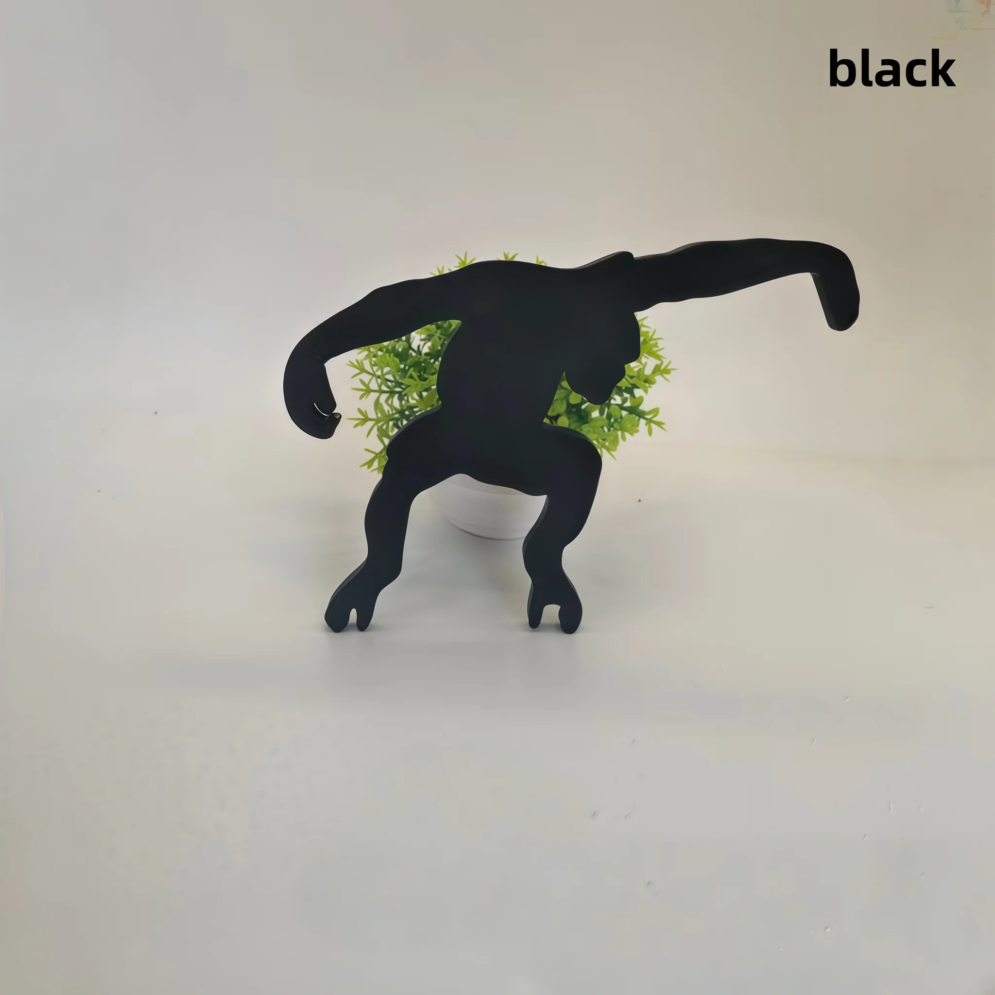 Monkey-shaped wall hooks for coats, bags, and decor