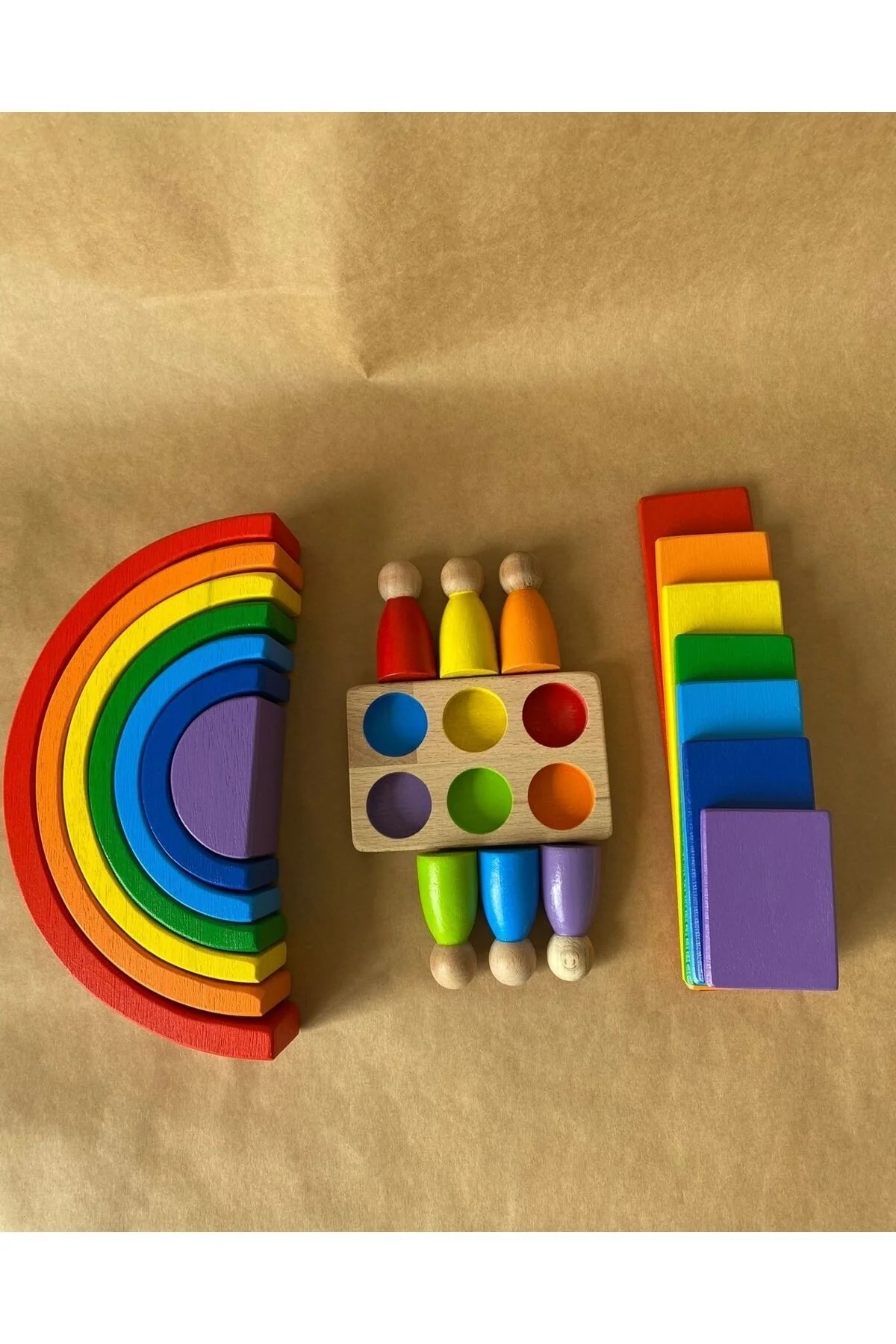 Handcrafted Waldorf rainbow and peg doll play set for sensory learning