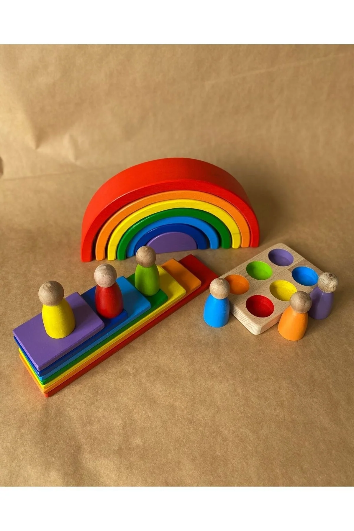 Handcrafted Waldorf rainbow and peg doll play set for sensory learning