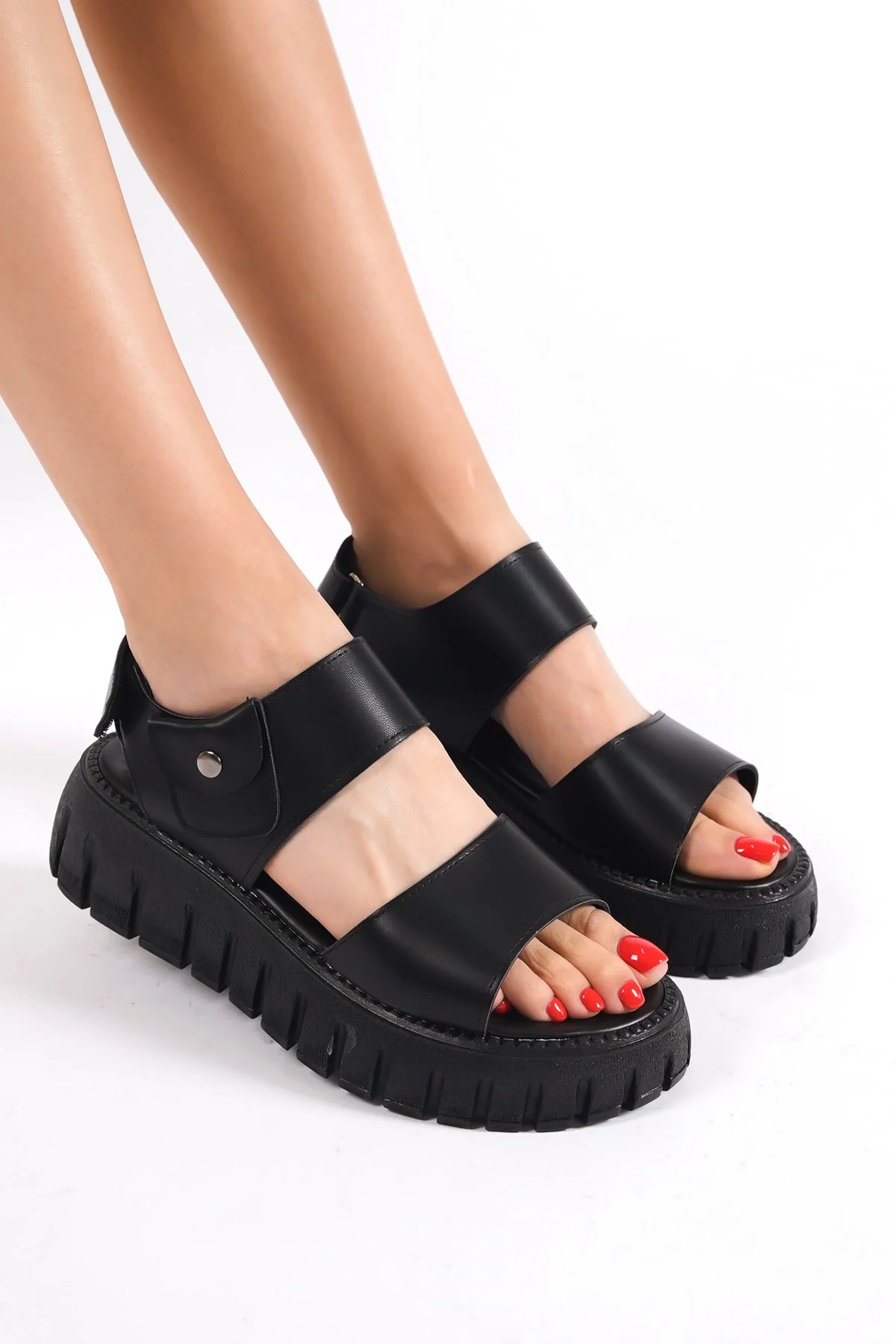 Black gladiator platform sandals with thick sole