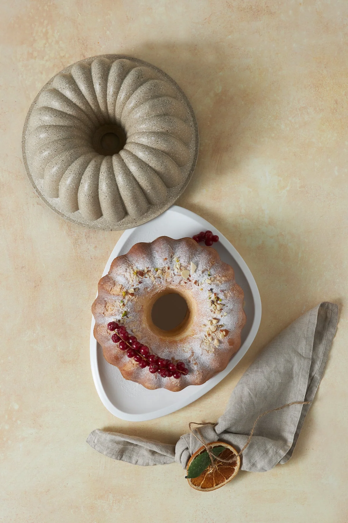 24cm round granite cake pan in ecru color
