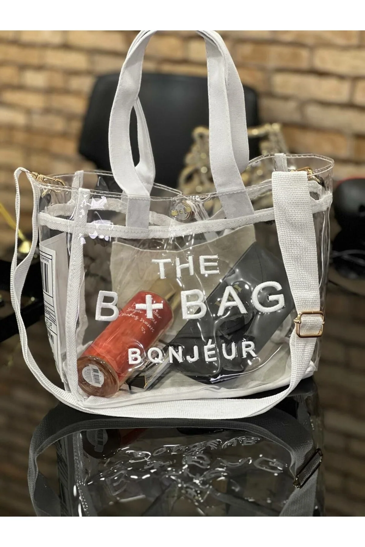Clear plastic crossbody bag with hang loop
