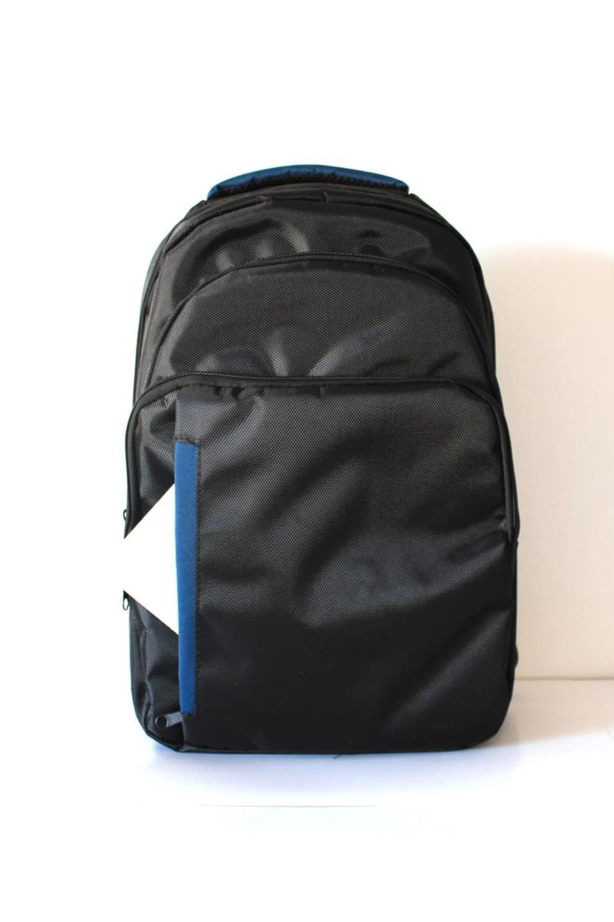 Lightweight black backpack with laptop compartment and bottle holder