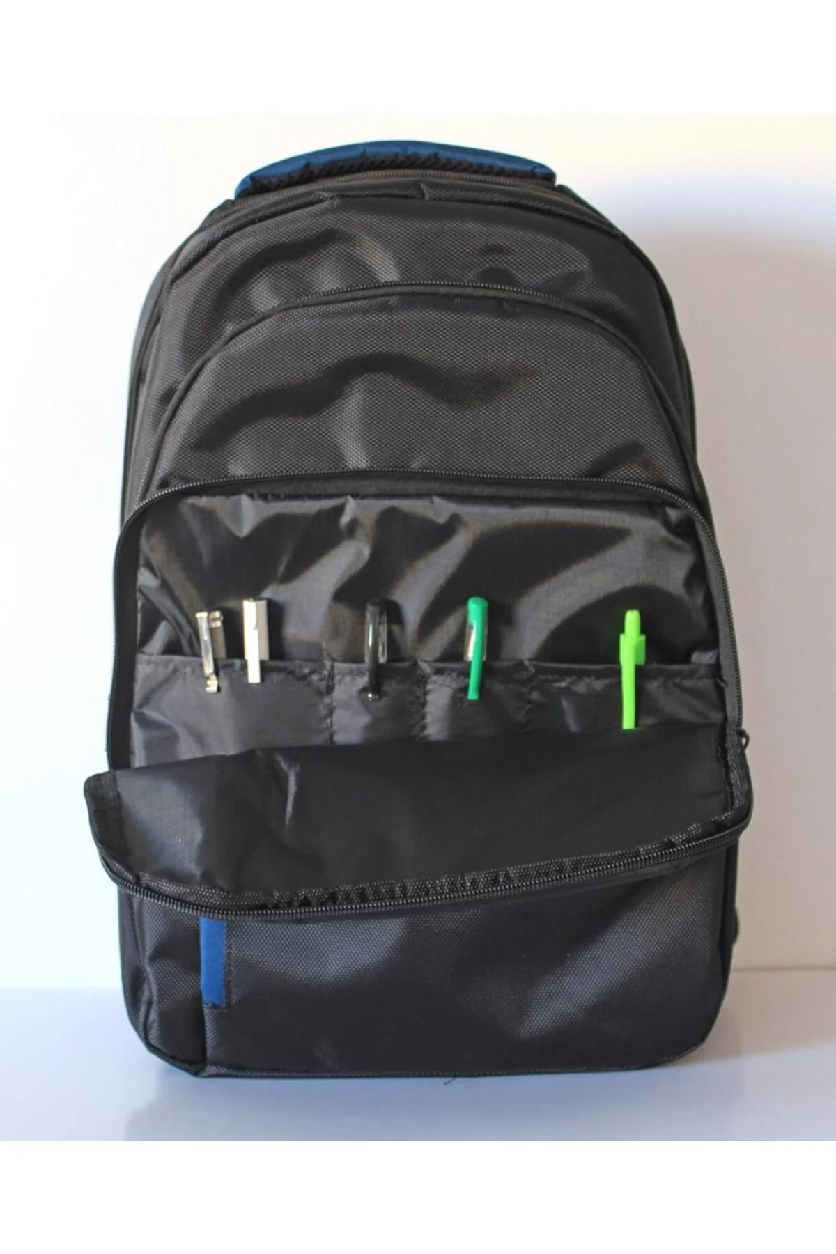 Lightweight black backpack with laptop compartment and bottle holder