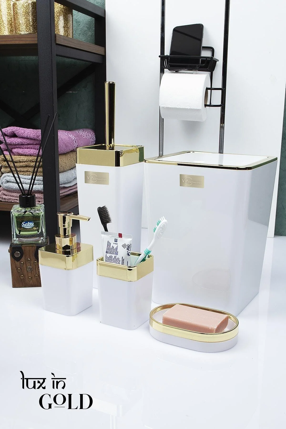 Modern white-gold bathroom set with essentials for sink and tub