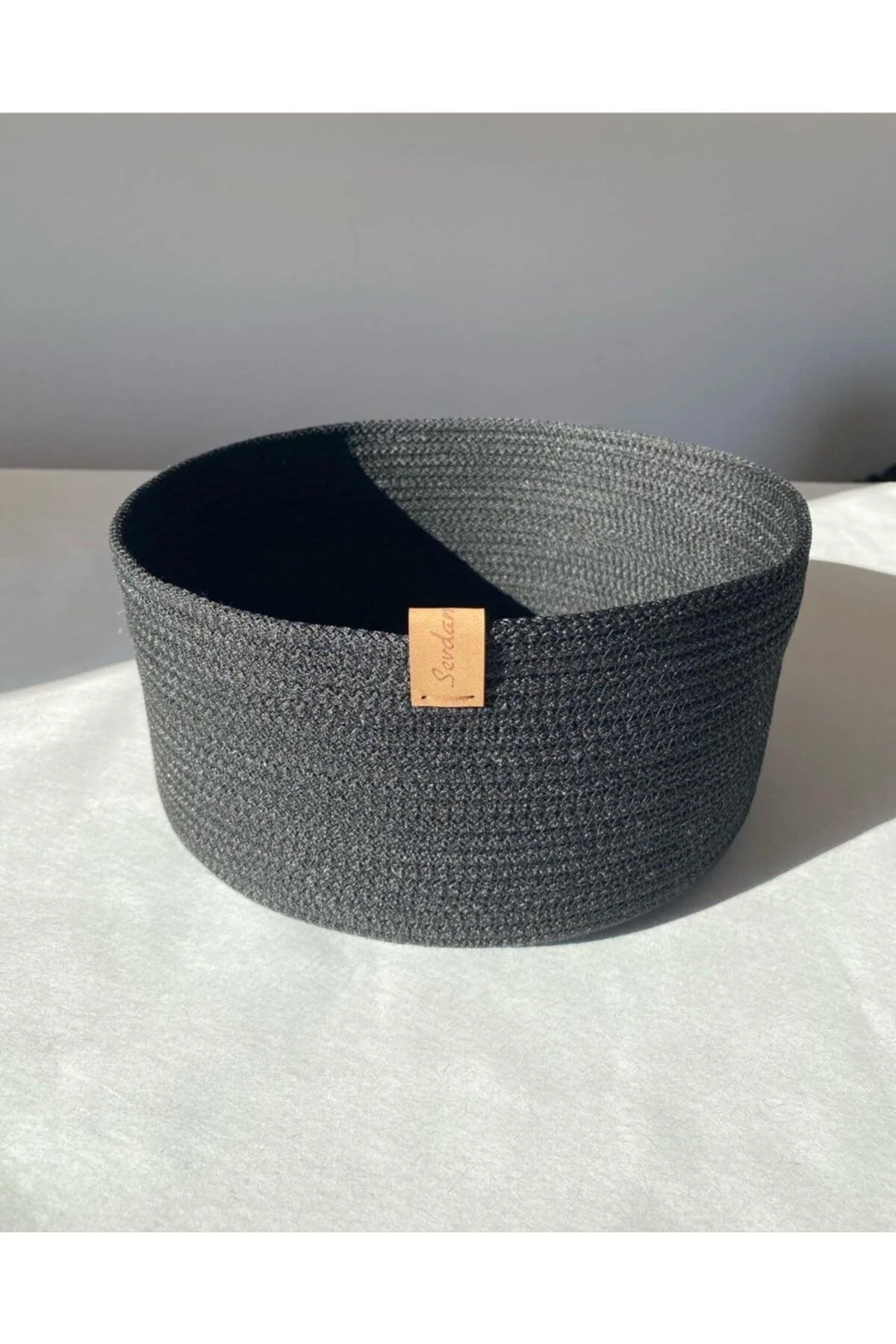 Large black cord rope storage basket in multiple sizes