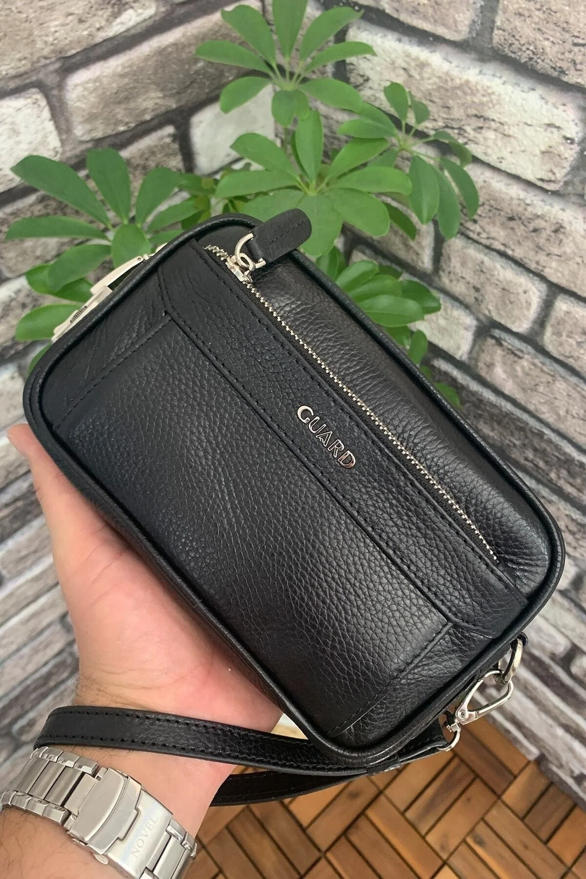 Black genuine leather password handbag with secure compartments and combination lock
