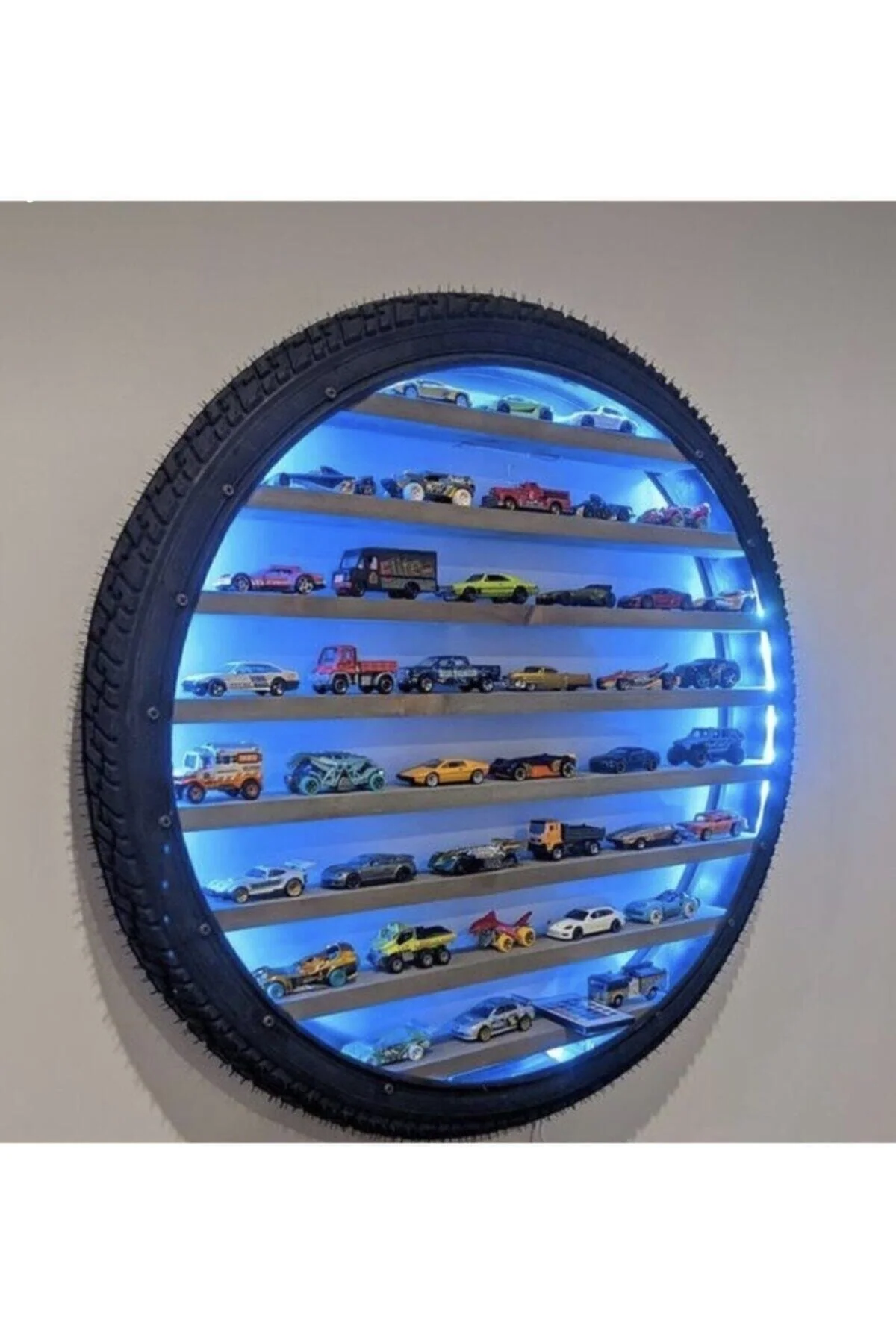 Wooden wall shelf with playful car display accents