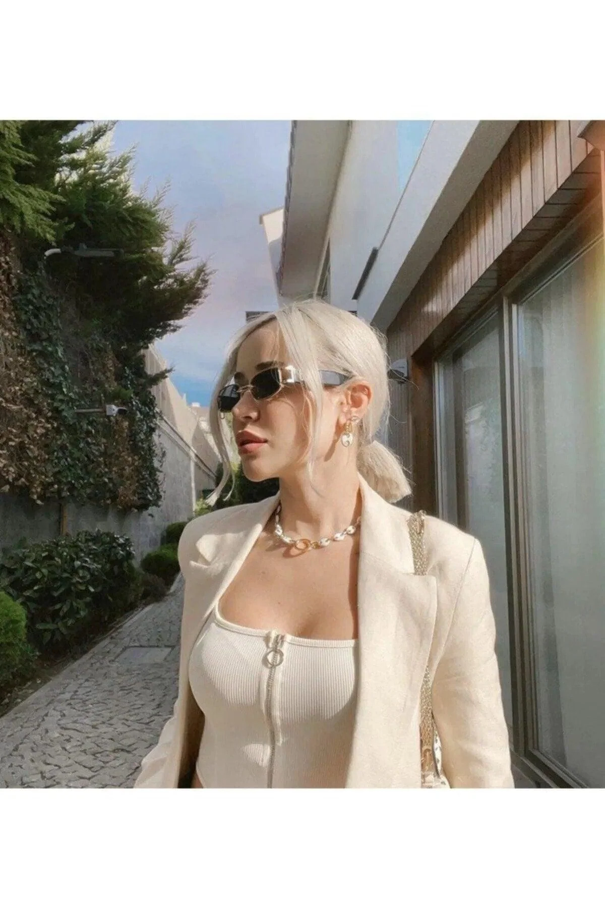 Black cat eye sunglasses with gold frame and UV400 protection