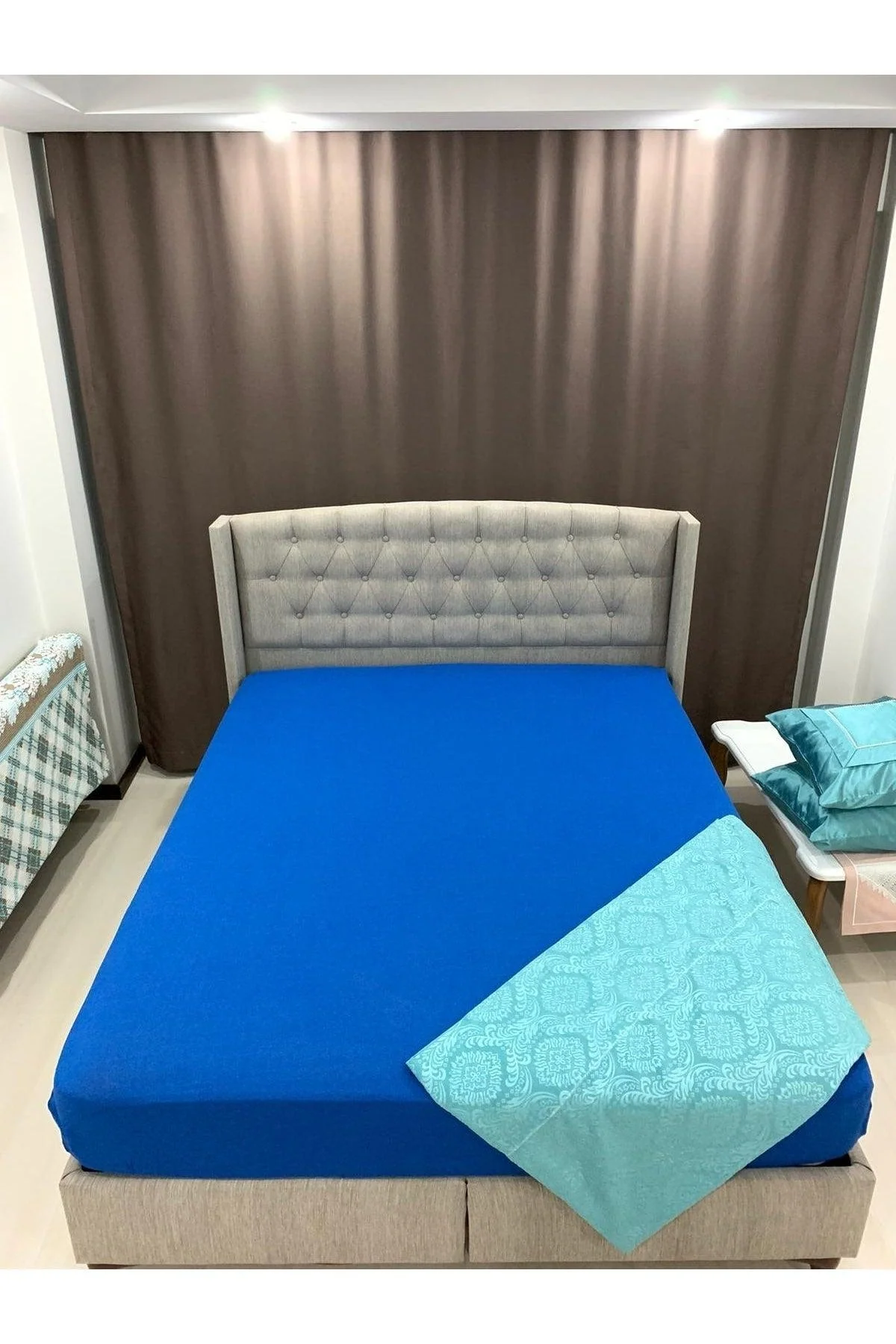 Premium blue fitted bed sheet with deep pockets and moisture-wicking fabric
