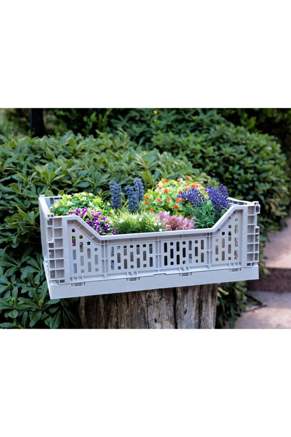 Collapsible gray plastic storage basket with foldable design