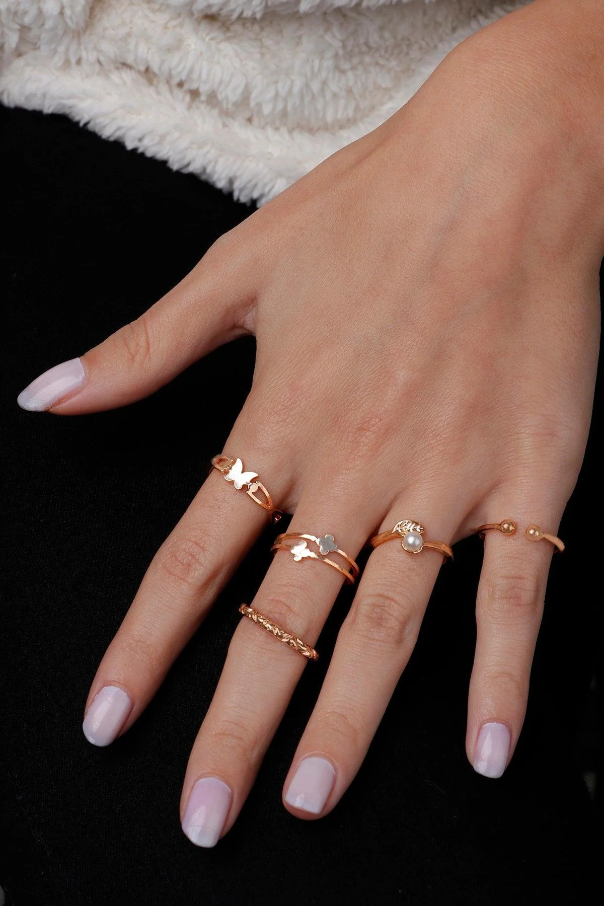 Five-piece adjustable ring set with butterfly and leaf motifs