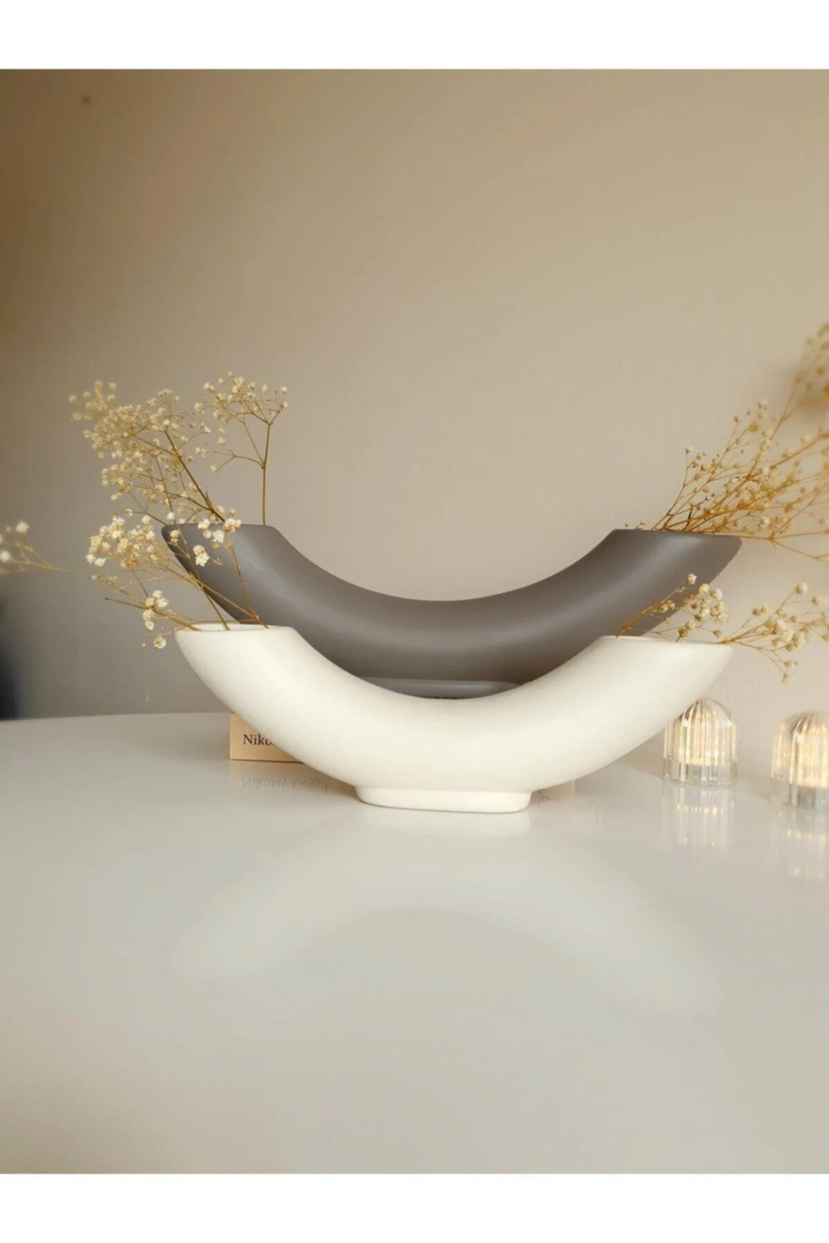 Pair of ceramic vases with sleek modern design in gray and ecru