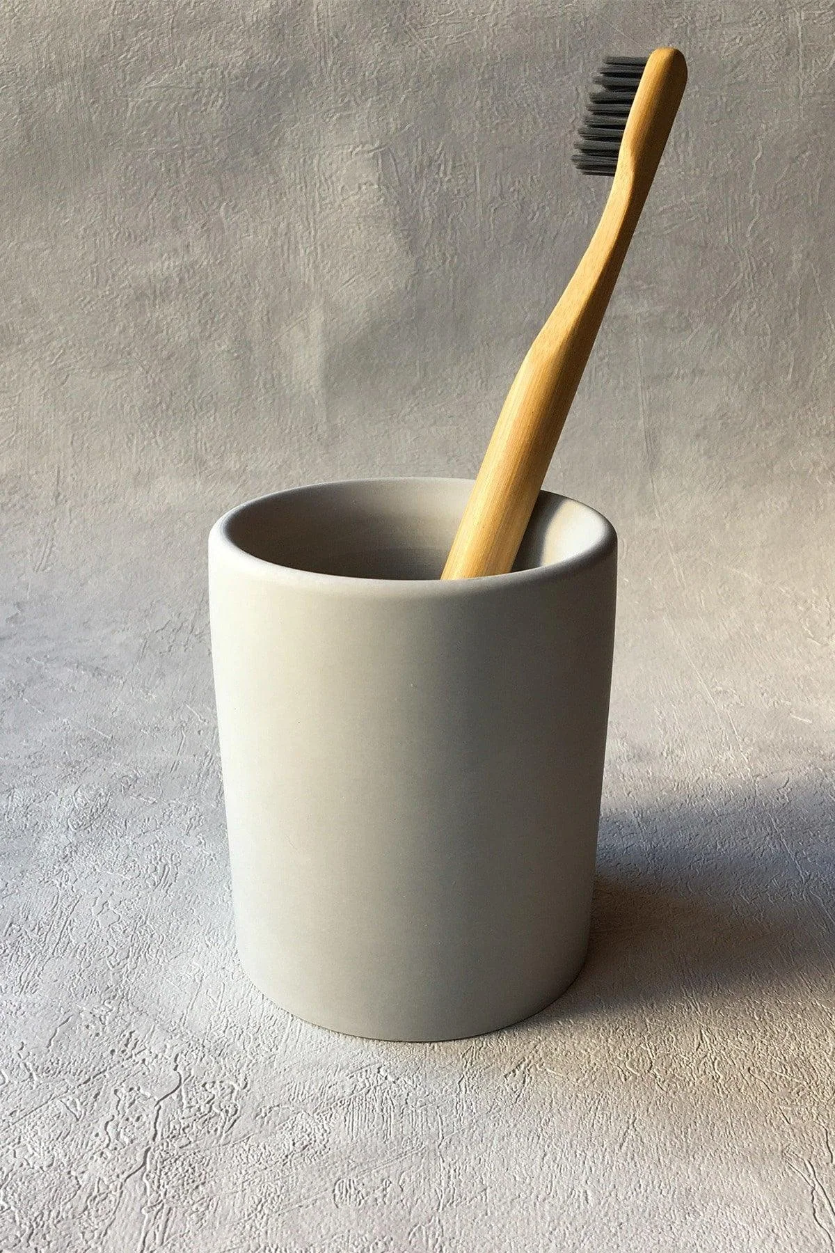 Gray Concrete Toothbrush Holder with Felt Base and Waterproof Finish