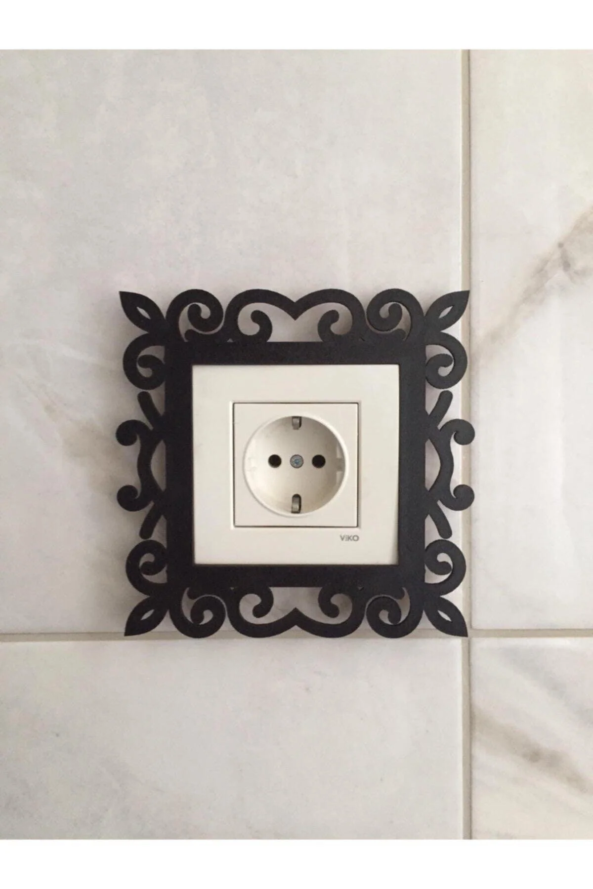 Wooden socket frame with double-sided adhesive