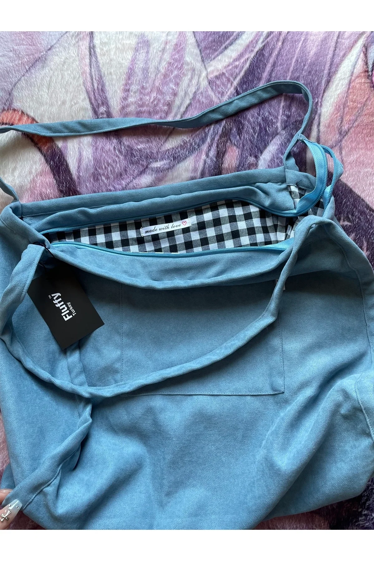 Navy blue tote bag with zipper and pockets