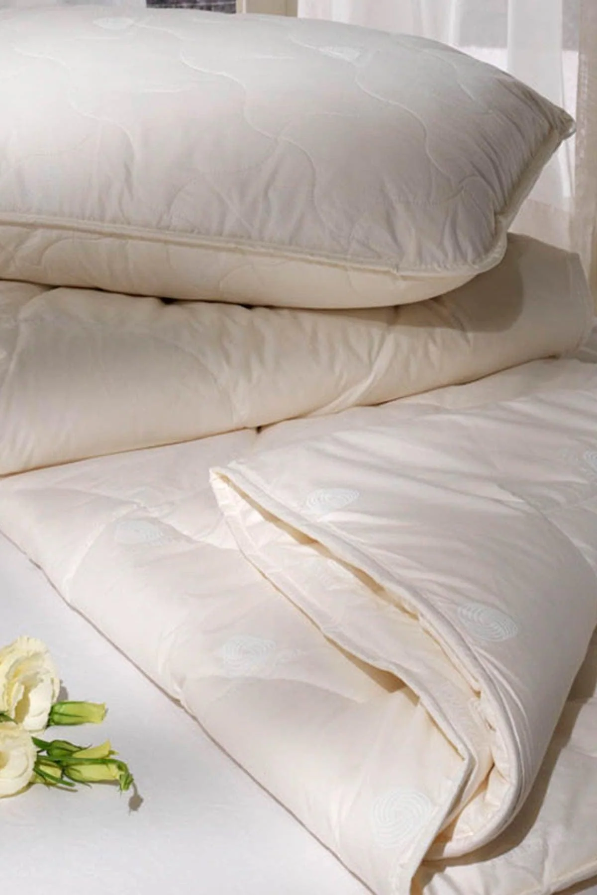 Cotton and bead wool filled duvet for all-season warmth